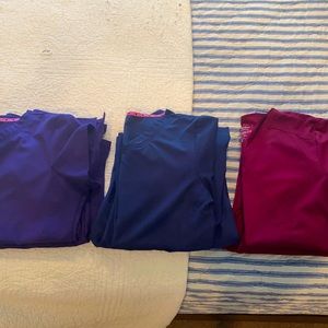 Three sets of scrubs